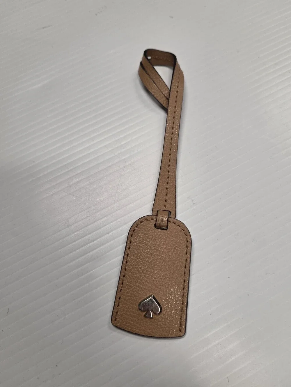 Kate Spade Tan Pebbled Leather Luggage Tag Bag Charm Purse Hangtag Logo